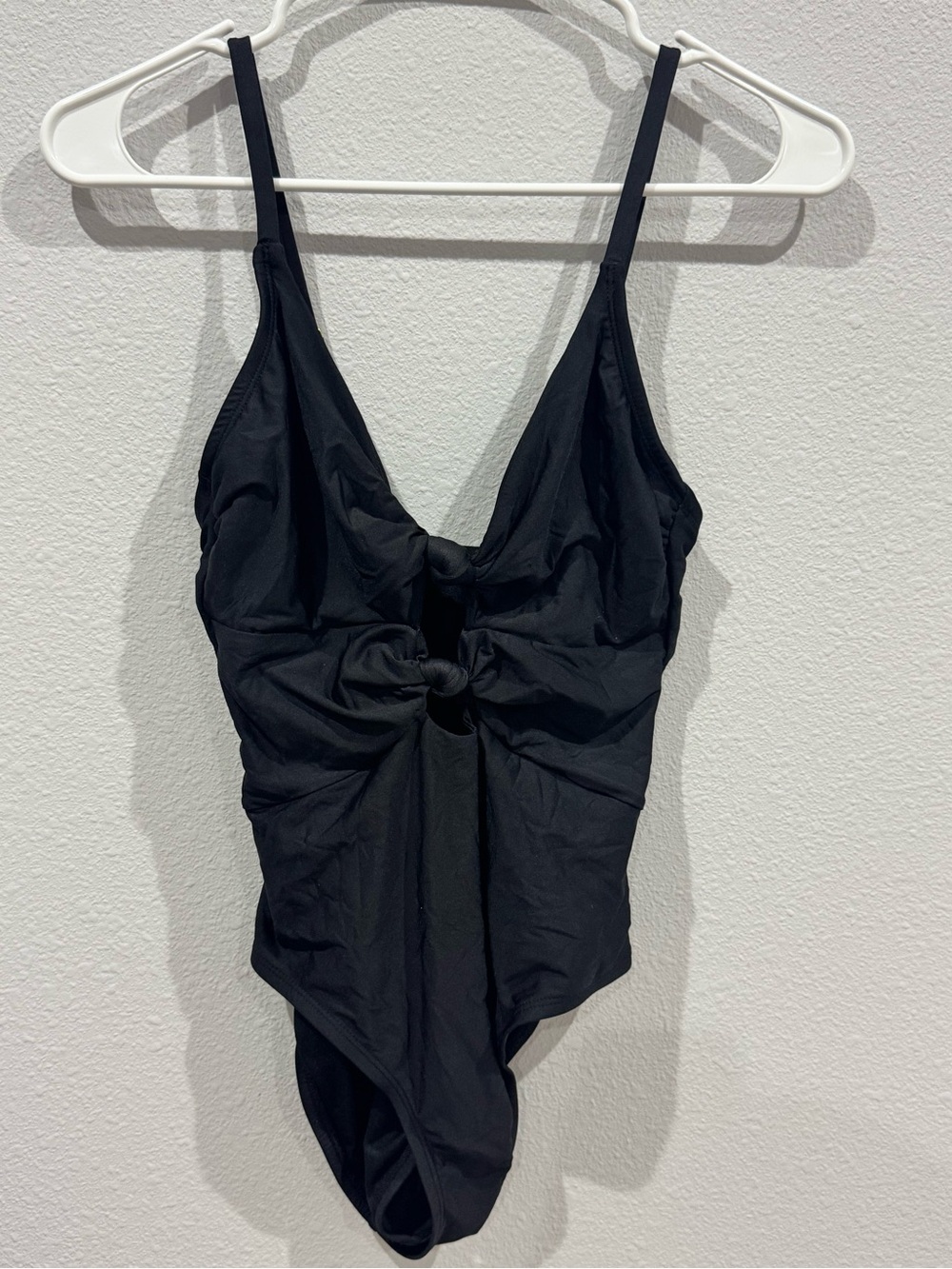 Sleek Black One-Piece Swimsuit with Front Knot Detail